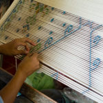 Process of ikat using colour coded plastic cord in Bali